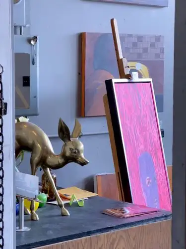 Where brass deer meet neon dreams and hidden art.